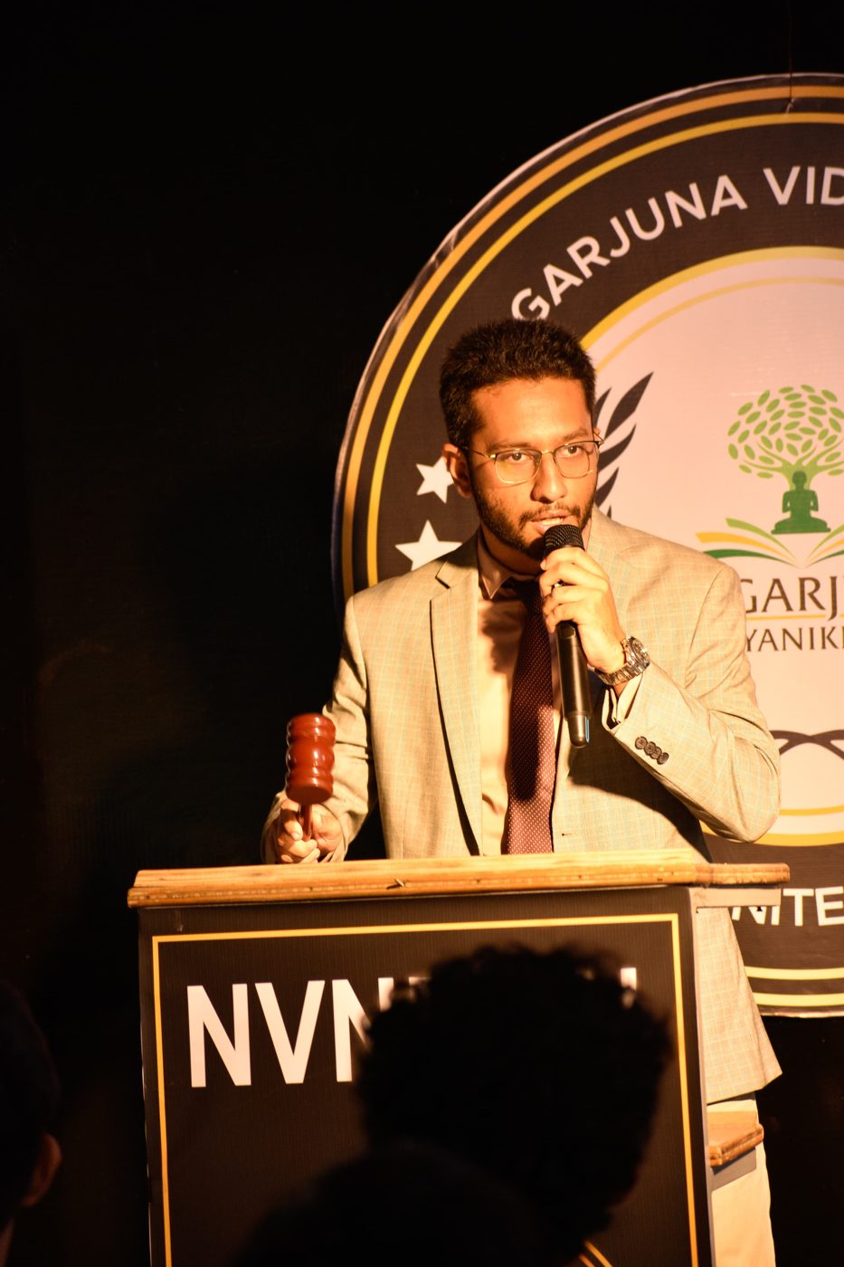 Abbas giving the Secretary General address at the NVNMUN podium