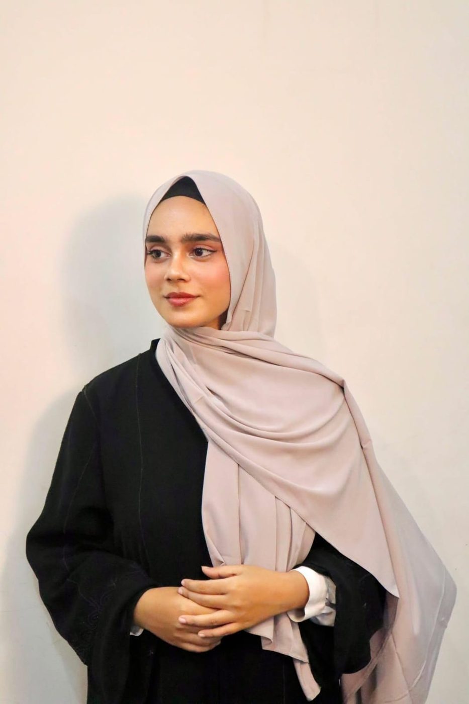 Arfa in a soft pink hijab